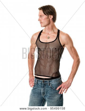 Man in mesh tank top and jeans. Studio shot over white.