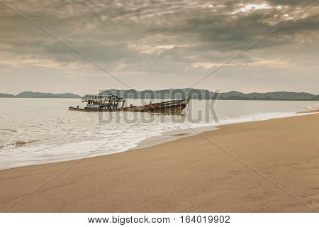 sea scape of wrech on sand beach