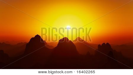 Solopgang over Sahara ørkenen, Hoggar bjerge, Algeriet