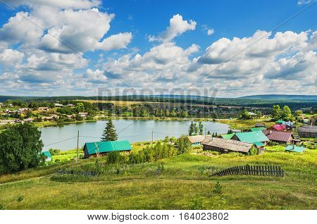 Summer rural landscape. Russia. Ural village Chusovoe founded in 1727 by Akinfy Demidov