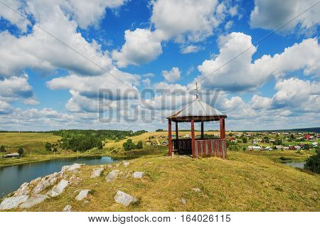 Gazebo on top of a hill in the village Chusovoe. Russia. Ural