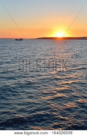 The View Of The Sunset Over The Crimea With A Ferry