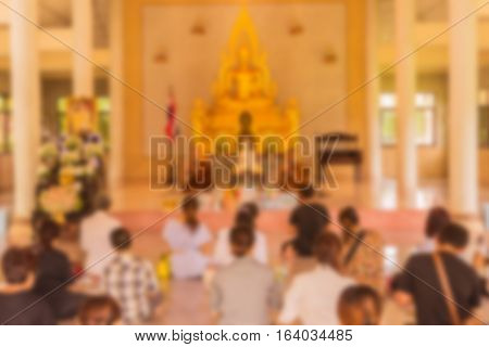 Abstract blur he monks and Thai Buddhist are praying in church in day time can be used as background