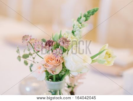 Beautyful Wedding decor. Wedding interior. Festive decor. Bouquet from spring flowers. Table decor. flower composition.