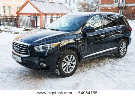 Smolensk, Russia - December 12, 2016: Luxury crossover Infiniti QX 60 HYBRID parked in winter street.
