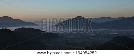 View from a place near Begnas Tal. Town Lekhnath and hills at dawn.