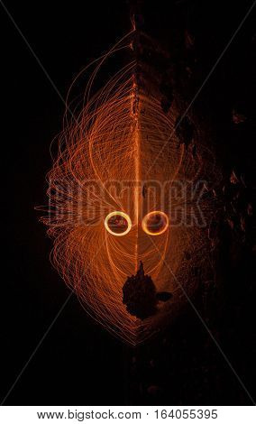 rotate mirror Burning steel wool on the beach