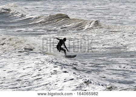 Waves and surfer silhouette - Summer time