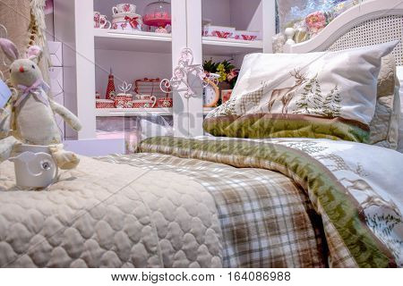 The bed in the children's bedroom closet with toys and gifts