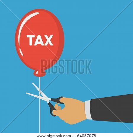 Hand cutting tax balloon with scissor. Business, finance and profit concept.