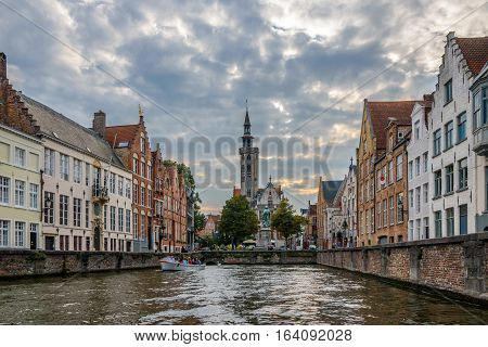 Canal in Bruges. Dramatic evening sky. Belgium.