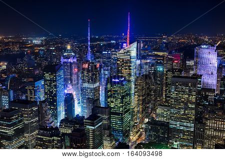 NEW YORK CITY USA - OCTOBER 5: New York Uptown and Times Square on October 5 2016 panorama aerial view at night with office building and skyscrapers skyline.