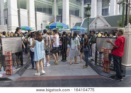BANGKOKTHAILAND - DEC 31 : view of crowd in Erawan shrine from gate while new year festival on december 31 2016 Thailand. Erawan shrine is famously sacred place in bangkok