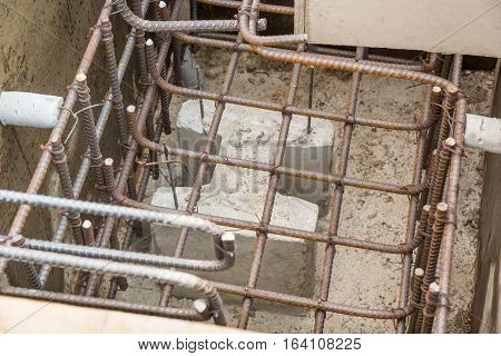 The concrete formwork and reinforcement steel for construction foundation.