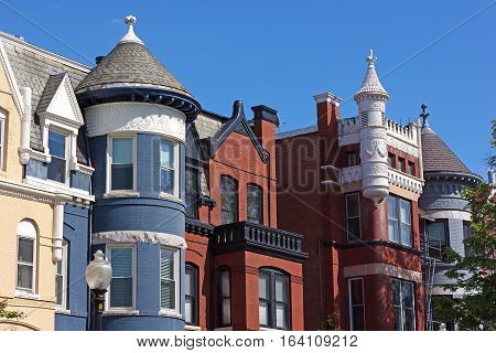 Colorful townhouses close up at Dupont Circle neighborhood in Washington DC. Luxury townhouses of Washington DC USA.