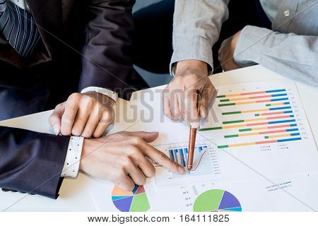 Team Work Process. Young Business Managers Crew Working With New Startup Project. Labtop On Wood Tab