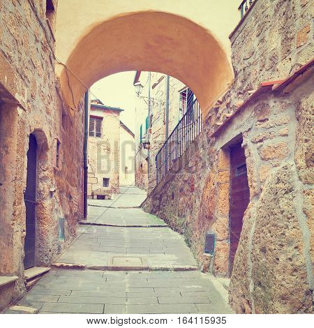Narrow Street with Old Buildings in Italian City of Sorano Instagram Effect