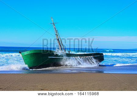 Shipwrecked Stranded Boat off Coastline due to bad weather