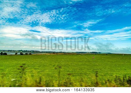 landscapes of agricultural fields photographed from the car near blackford town in the Highlands Scotland