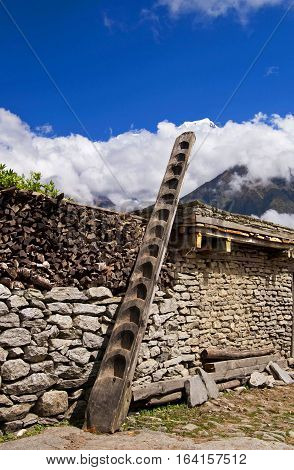 Old ledder on the old house in mountains, Nepal