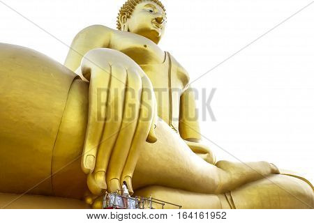 Asian woman is begging the Biggest Buddha at Wat Muang Angthong Thailand