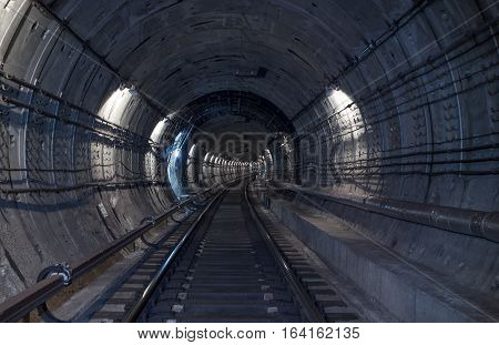 Underground tunnel. Railway in a subway tunnel