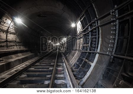 Underground tunnel. Railway in a subway tunnel