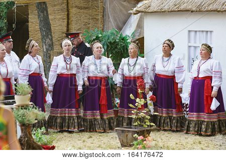 SLAVYANSK-ON-KUBAN RUSSIA - JULY 31.2015: Cossacks sing at a village fete