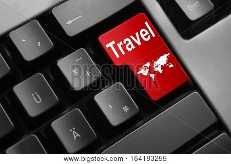 grey keyboard red enter button travel world