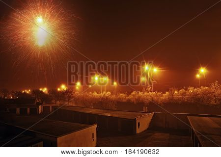 Chomutov Ustecky kraj Czech republic - January 01 2017: garages and road number 13 with firework during the New Year