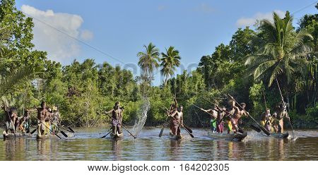 Indonesia, Irian Jaya, Asmat Province, Jow Village - June 23: Canoe War Ceremony Of Asmat People. He