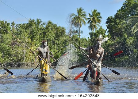 Indonesia, Irian Jaya, Asmat Province, Jow Village - June 23: Canoe War Ceremony Of Asmat People. He