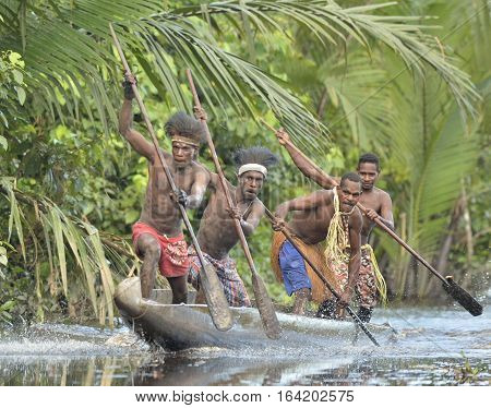 Indonesia, Irian Jaya, Asmat Province, Jow Village - June 23: Canoe War Ceremony Of Asmat People. He