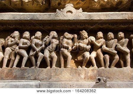 Statue of male female in myriad moods sculpted on wall panel of Lakshman Temple Khajuraho Madhya Pradesh India Asia