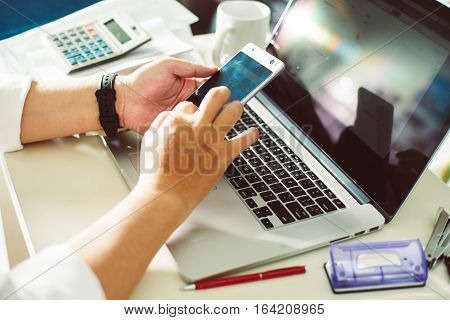businessman hand using smart phonemobile payments online shopping.Seleted focus.