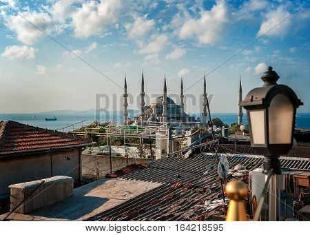 Turkey Istanbul. View over the rooftops of the old city Blue mosque (or Sultanahmet mosque) and the Bosphorus.