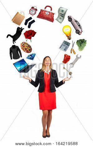 Women interests. Woman commitments, passions and desires. A beautiful woman has in her hands the objects of her desires and dreams. The female can handle everything with complete mastery and ability. White background.