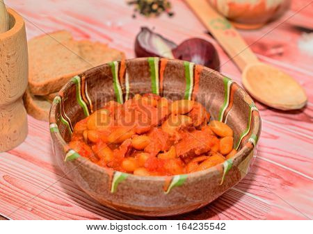 Romanian Traditional Food, Beans With Smoked Pork (fasole Cu Ciolan), Red Onion, Wooden Spoon, Salt