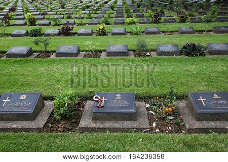 KANCHANABURI, THAILAND - January 1, 2017: Chungkai War Cemetery in Thailand, Graveyard for soldiers and captives in the Kwai river bridge (Death Railway).