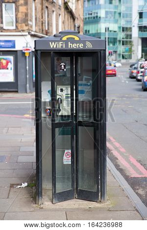 Edinburgh Scotland - September 10 2016: callbox with wifi hotspot. Edinburgh is the capital of Scotland its old and new town are UNESCO listed