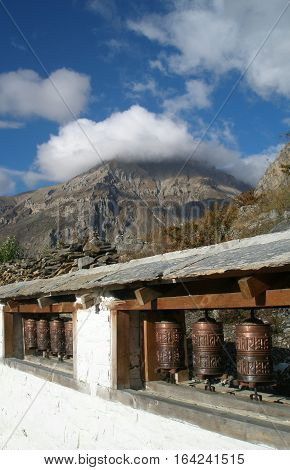 Old Prayer Wheels near village Ranipauwa, Mustang district, Nepal