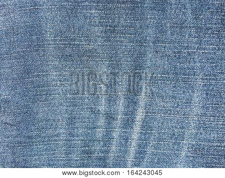 Texture of blue jeans demim fabric background