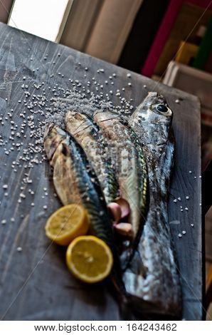 blue fish freshly caught great for a healthy diet ready to be cooked with lemon and oil
