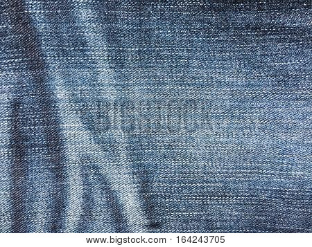 Texture of blue jeans demim fabric background