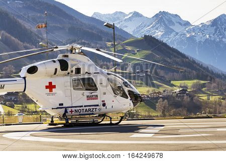 Matrei, Austria - March 28: Red Cross Medic Md Helicopter Md Explorer By Mcdonnell Douglas Helicopte