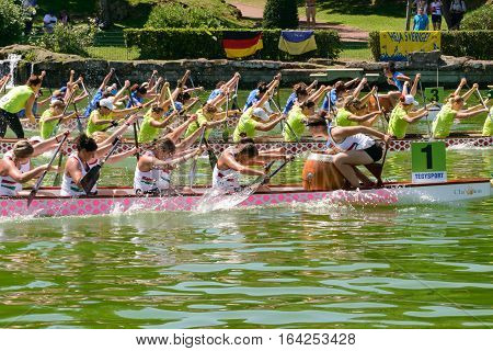 Rome Italy - July 30 2016: Dragon boat crews compete at the european championships held in Italy in 2016 summer in the photo the Italian crew against the Ukraine and Hungary crew during the race