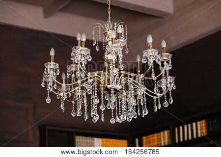 classic vintage golden chandelier adorned with beads and crystals