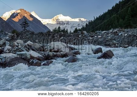 Mountain Altai. Akem fast mountain river on a background of mountain Belukha
