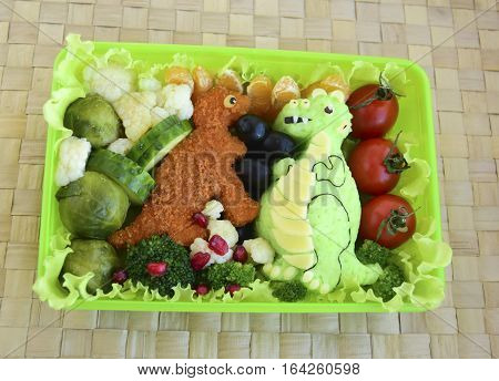 The dinosaur is made of rice. Creative food for good mood and appetite. Kyaraben, bento