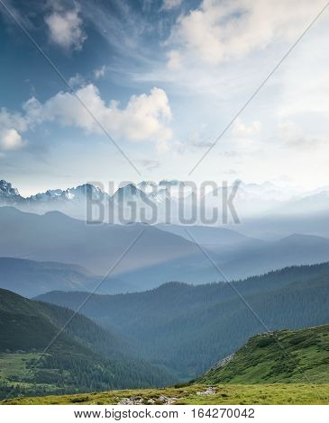 Hills during sunrise in mountain valley. Beautisul natural landscape